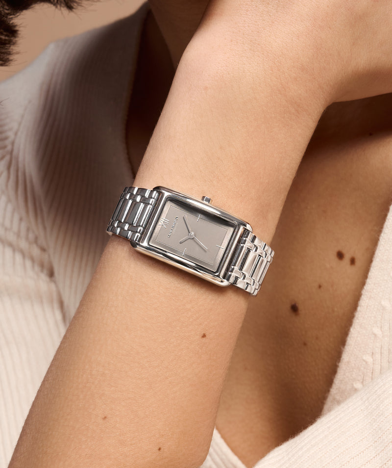 The Olivia Burton Grove Grey Dial Bracelet Watch, a grey stainless steel bracelet watch from Olivia Burton, available at OD’s Jewellers in St Helens