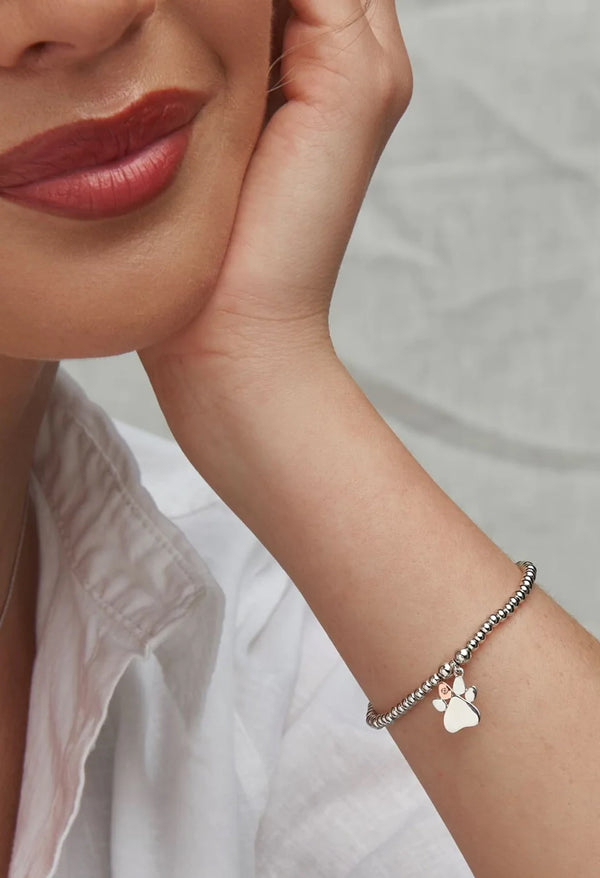 The Clogau Paw Prints Affinity Bracelet With White Topaz in Sterling Silver, a silver bracelet from Clogau, available at OD’s Jewellers in St Helens.