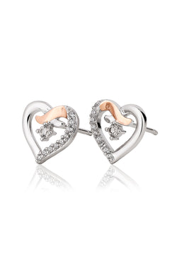Sterling silver Clogau kiss stud earrings featuring CZ accents. Jewelry detail promoting Forever Yours collection.