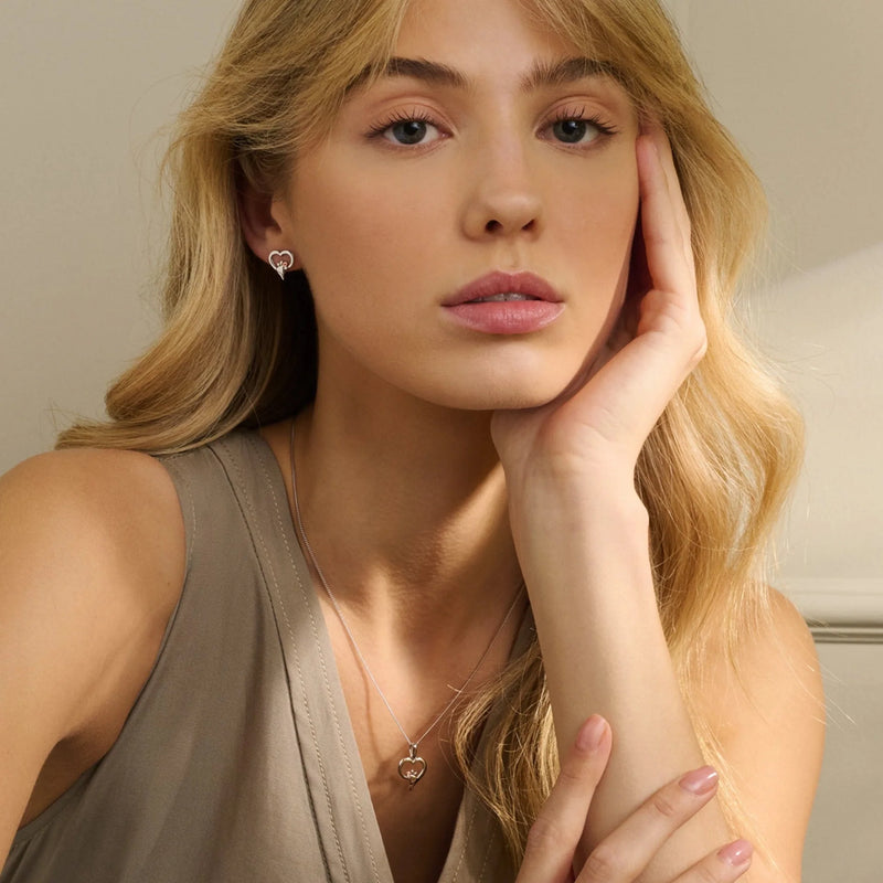The Paw Print and Heart Pendant, a silver sterling pendant from Clogau, available at OD’s Jewellers in St Helens