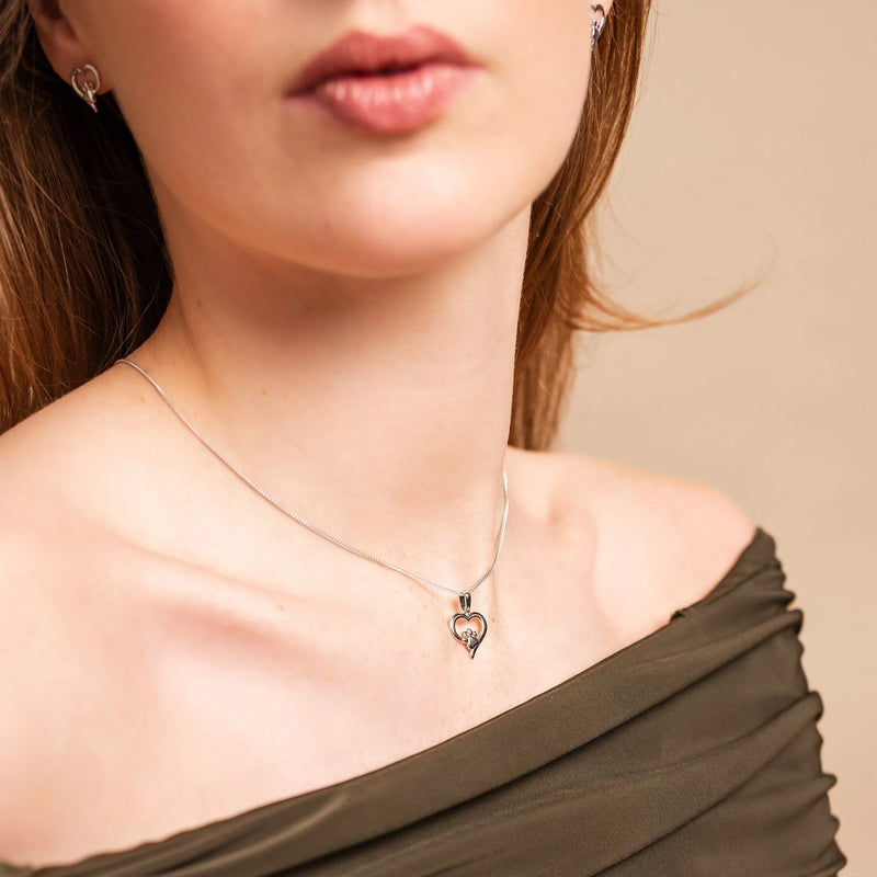 The paw print and heart pendant, a sterling silver necklace with white topaz from Clogau, at OD’s Jewellers in St Helens