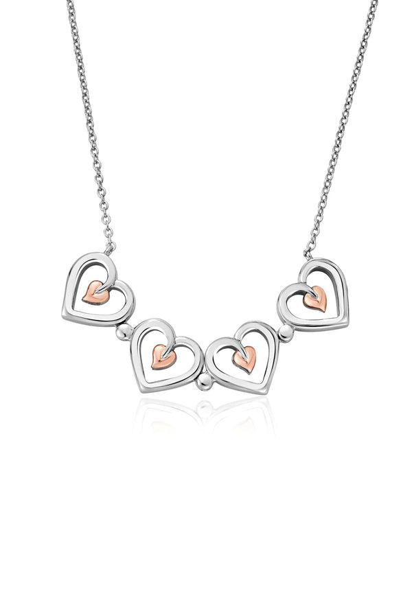 Clogau Tree Of Life heart pendant necklace. Sterling silver Celtic design with rose gold heart.