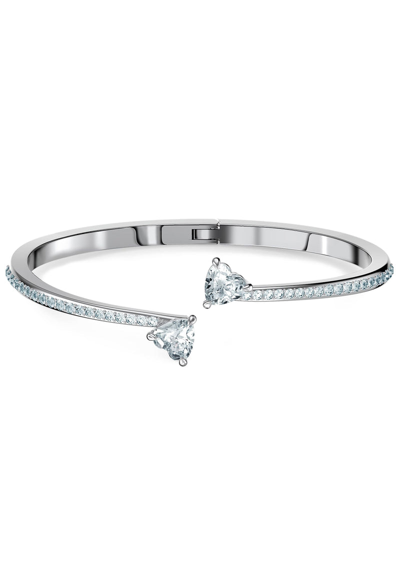 The Swarovski Attract Soul Heart Bangle, a silver metal bracelet from Swarovski, available at OD’s Jewellers in St Helens.