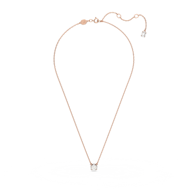 Rose gold plated Swarovski Constella necklace with a round cut crystal pendant. Elegant jewelry display.