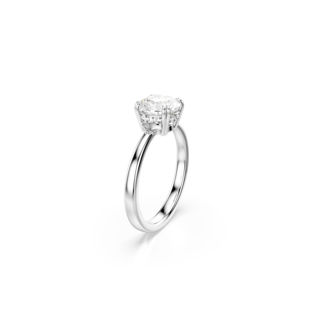 Elegant cocktail ring featuring a sparkling round cut Swarovski crystal on a rhodium-plated band.