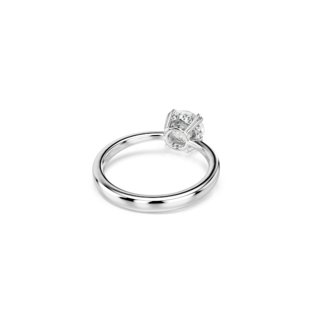 Rhodium-plated cocktail ring with round cut crystal. Jewelry showcasing elegant design and detail.