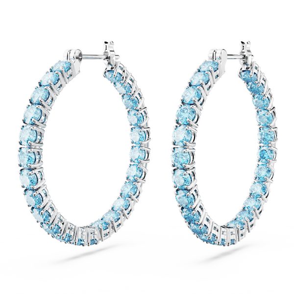 Pair of blue Swarovski crystal hoop earrings, rhodium plated jewelry. Sparkly, stylish earrings for women.