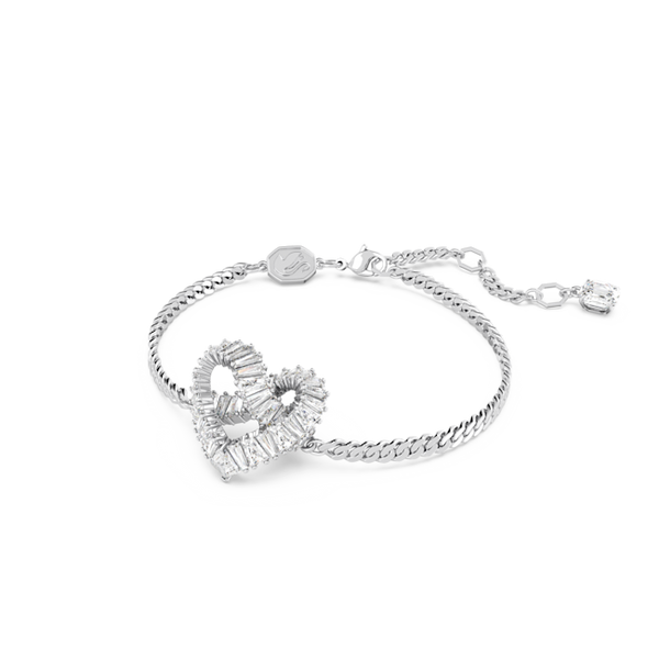 Rhodium plated Swarovski heart bracelet. Matrix collection with mixed cut clear crystals on a silver tone chain.