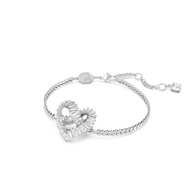 Rhodium plated Swarovski heart bracelet. Matrix collection with mixed cut clear crystals on a silver tone chain.