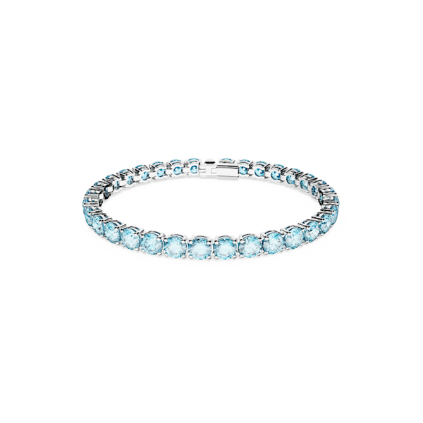 Blue Swarovski tennis bracelet, size M, showcasing the rhodium-plated design and crystal sparkle. Elegant jewelry close-up.