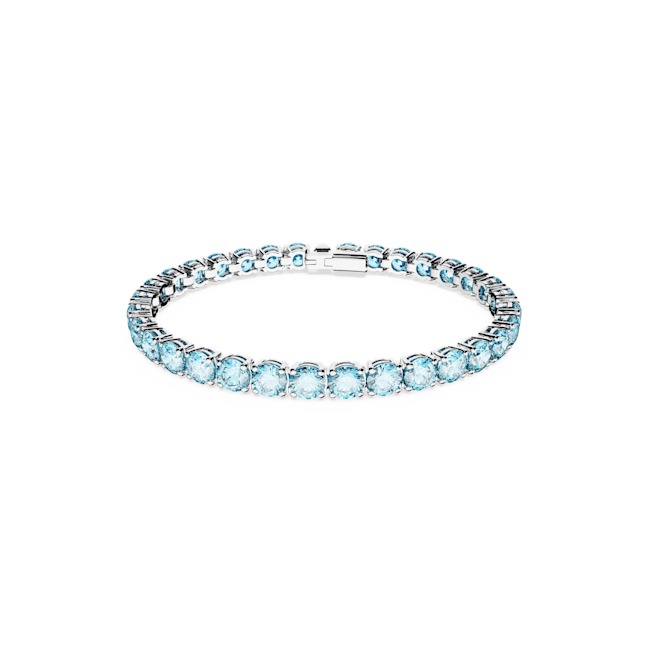 Blue Swarovski tennis bracelet, size M, showcasing the rhodium-plated design and crystal sparkle. Elegant jewelry close-up.