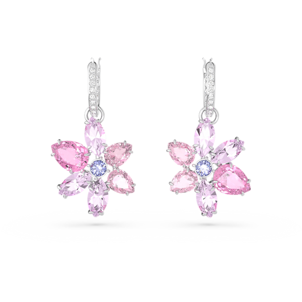 Swarovski flower earrings. Gema pink mixed cut crystal blossoms on rhodium-plated hoops, close up.
