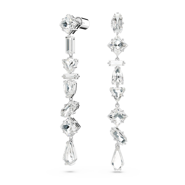 Swarovski Mesmera earrings, rhodium plated with asymmetrical, dangling clear crystals. Elegant jewelry.