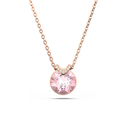 Rose gold pendant necklace featuring a sparkling pink crystal. A timeless Swarovski jewelry gift.