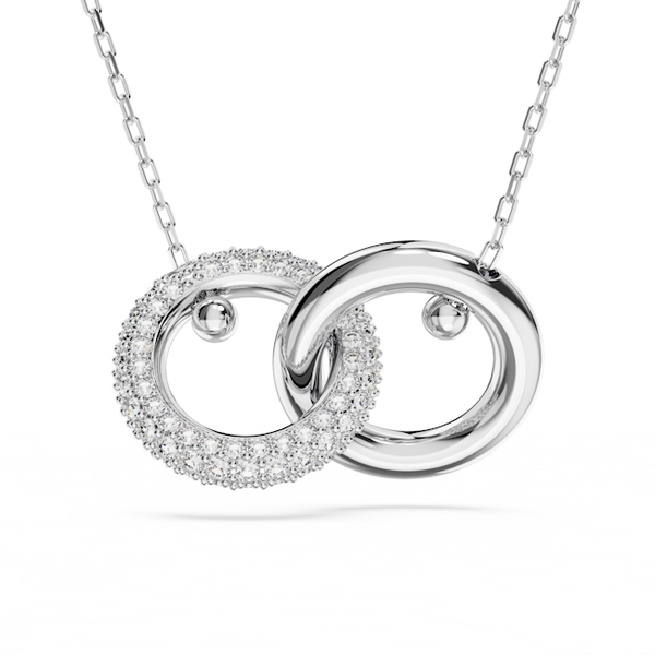 Rhodium plated pendant featuring interlocking rings, one with sparkling crystals. Elegant jewelry.