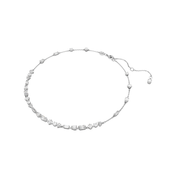 Rhodium plated Swarovski necklace showcasing mixed cut crystals on a delicate chain. Modern, elegant jewelry design.