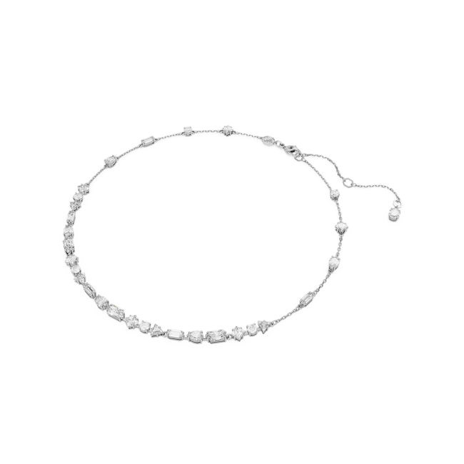 Rhodium plated Swarovski necklace showcasing mixed cut crystals on a delicate chain. Modern, elegant jewelry design.