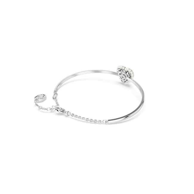 Rhodium-plated Swarovski bangle featuring a pearl crystal heart drop accent, showcasing the delicate design.