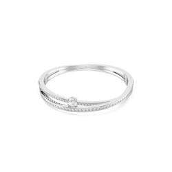 Hyperbola Bangle, rhodium plated, featuring a single, centrally set stone, showcasing mixed cuts & sparkling design.