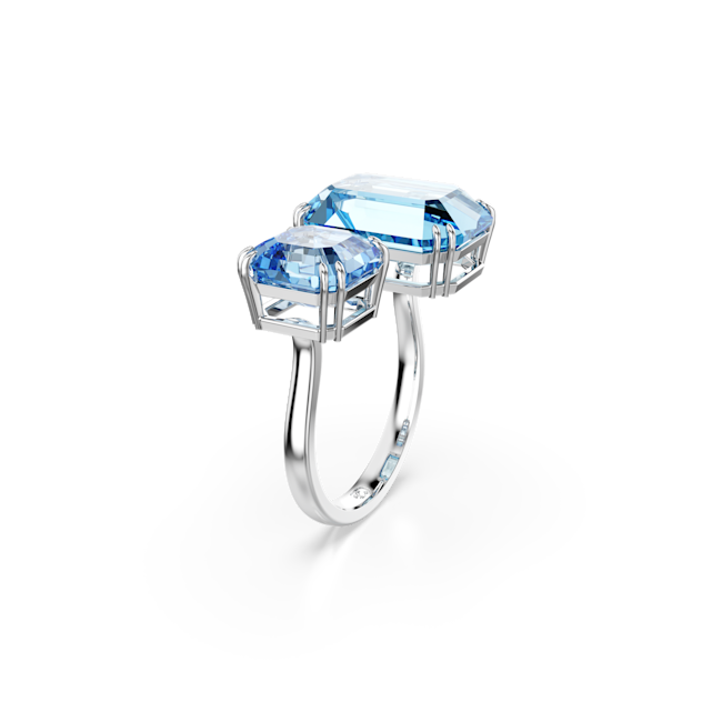Swarovski Milenia ring featuring two blue octagon-cut crystals on a rhodium-plated band. Elegant jewelry design.