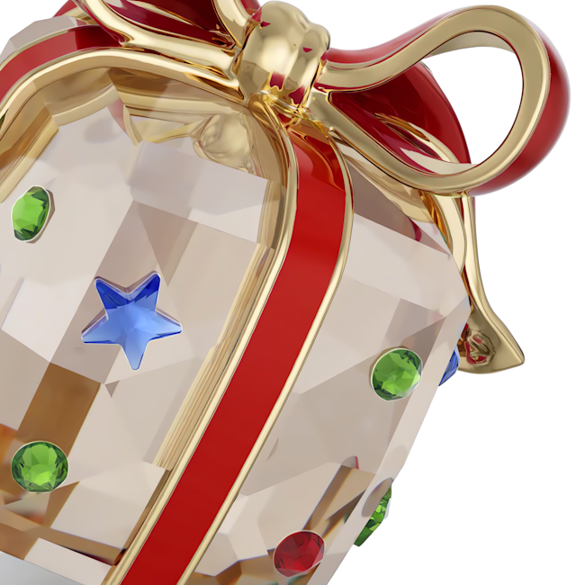 Close-up of the Swarovski Crystal-Cut Holiday Cheers Gift Ornament. Dazzling gift with red ribbon and colorful star jewels.