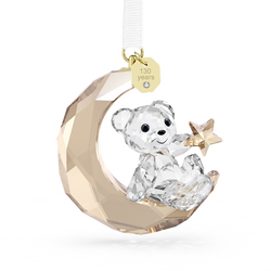 Swarovski Kris Bear 2025 ornament. Crystal bear on moon with star, "130 years" tag. Collectible Christmas decor.
