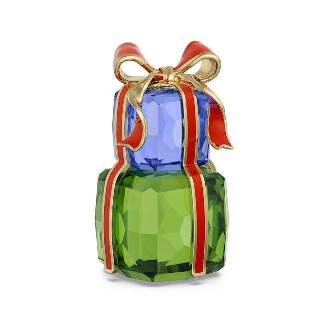 Swarovski crystal ornaments set. Festive gift display with blue and green crystal presents and a red ribbon. Holiday décor.