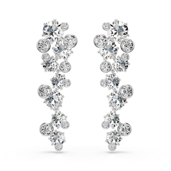 Elegant rhodium plated drop earrings with sparkling white Swarovski crystal accents. Stylish jewelry for a special occasion.