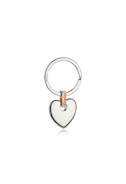 Clogau Cariad Heart Key Ring, a delicate design featuring a heart symbol crafted from silver and rose gold.