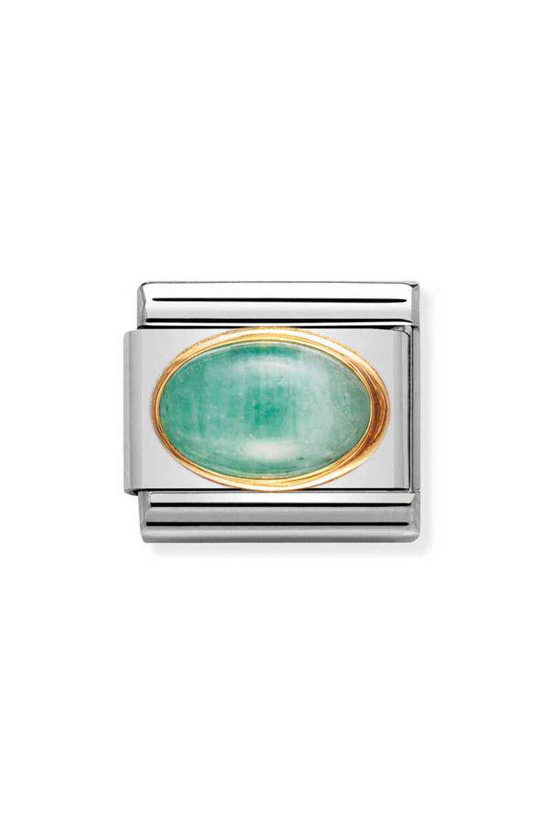 Silver charm with a green oval stone set in gold.
