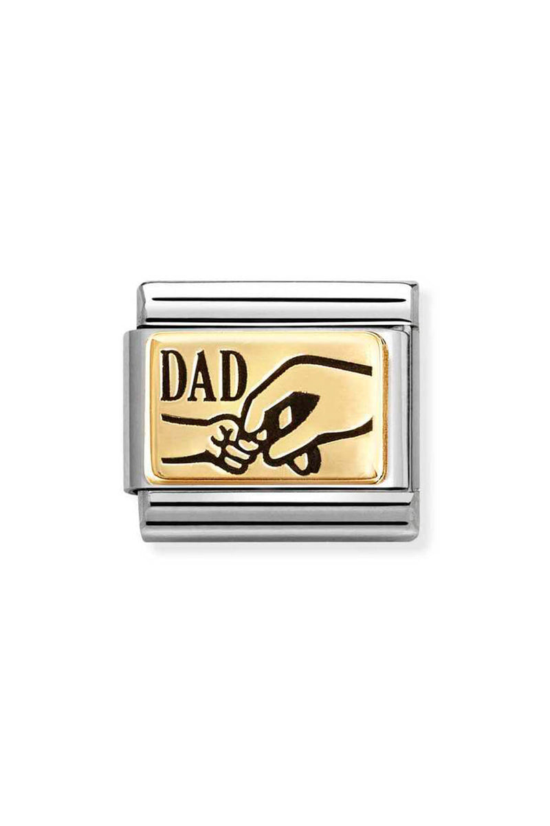Silver and gold charm reading "Dad" with a graphic of a large hand holding a small hand.