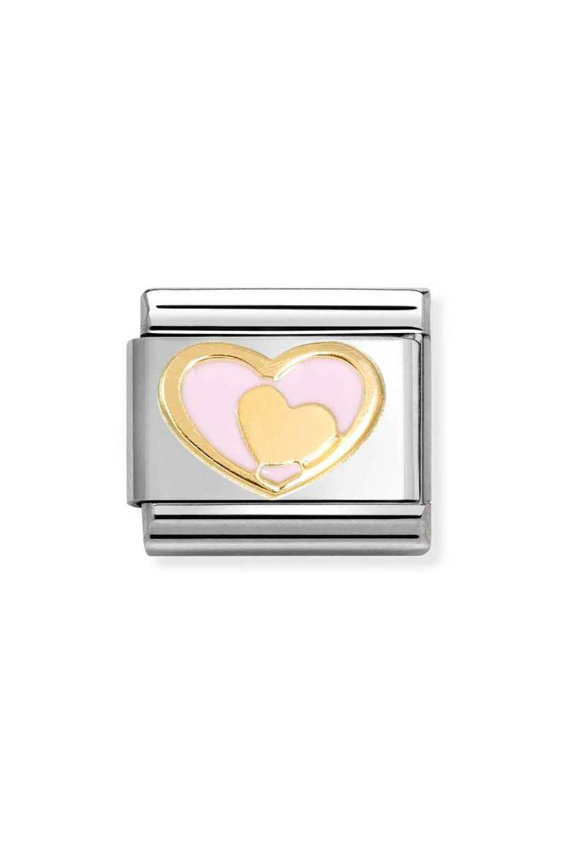 Close-up of a silver and gold charm with a pink and gold heart design.