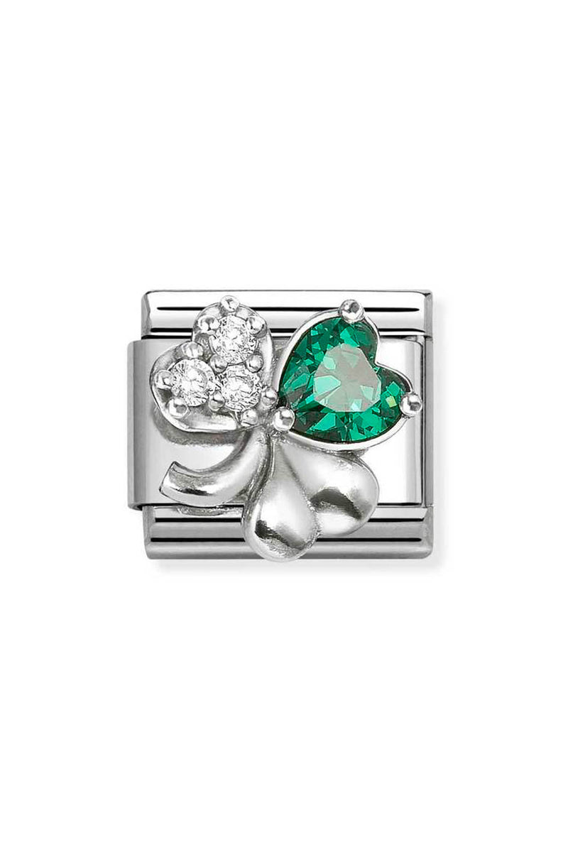 Silver charm with clover and green gem.