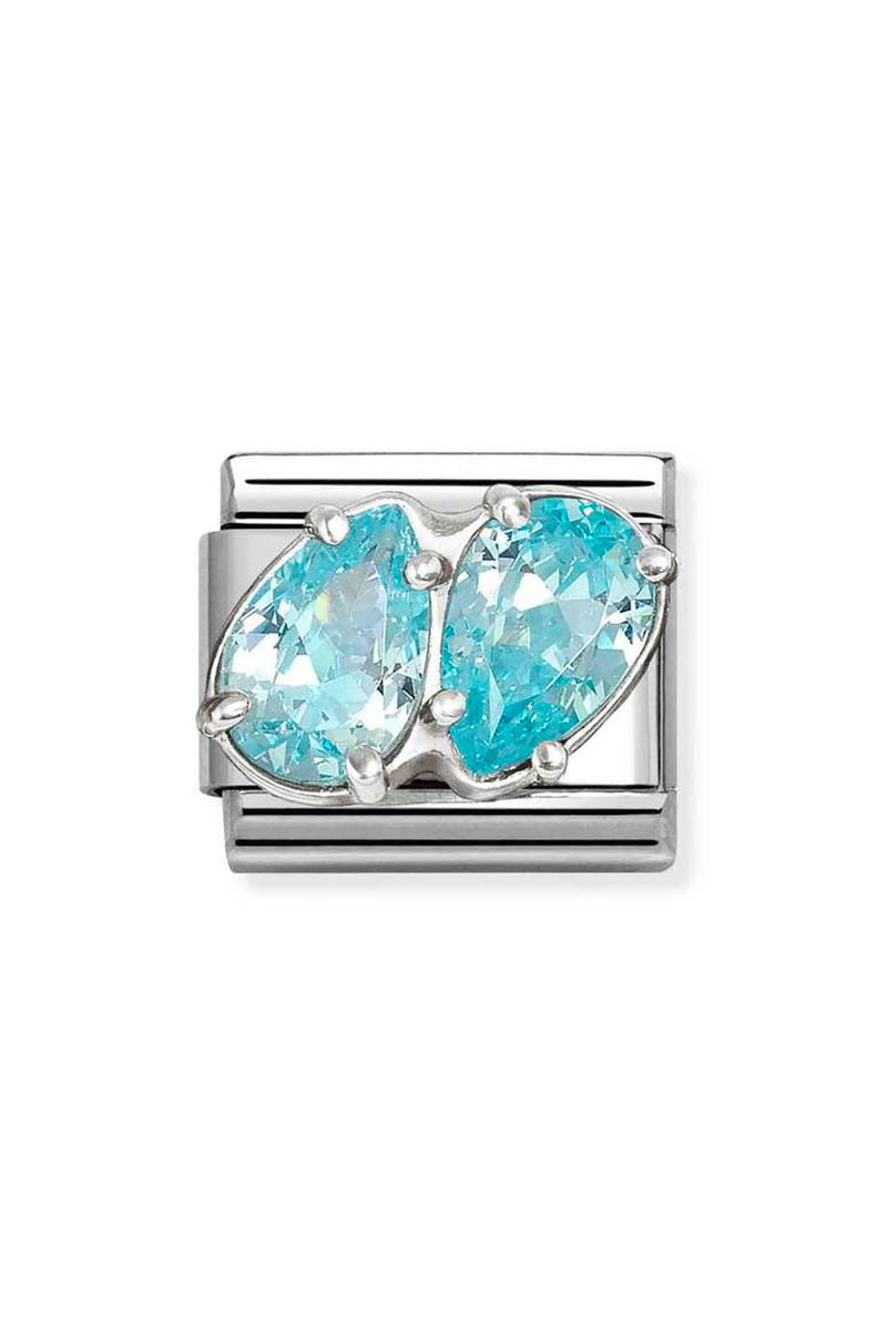 Square, silver bracelet charm with two tear-drop shaped, light blue gemstones.
