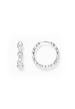 Silver Thomas Sabo hoop earrings with cubic zirconia stones. Elegant jewelry detail, showcased against a white background.