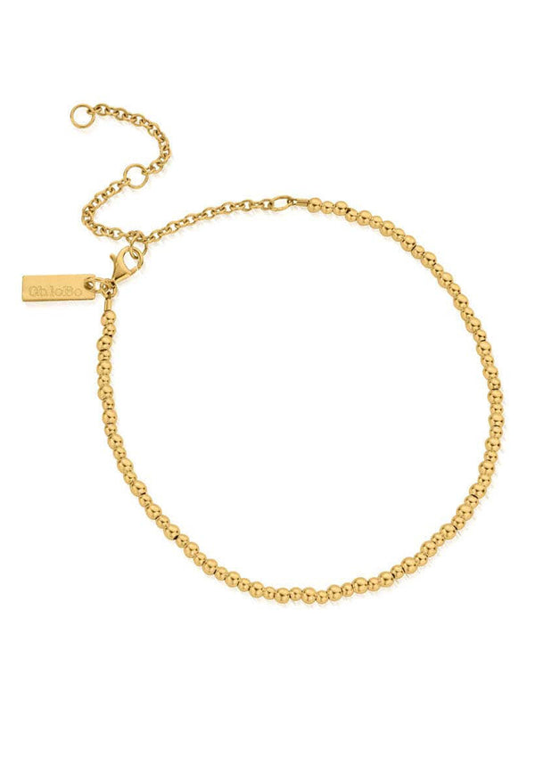 The ChloBo Mini Cute Anklet, a gold beaded anklet from ChloBo, available at OD’s Jewellers in St Helens.