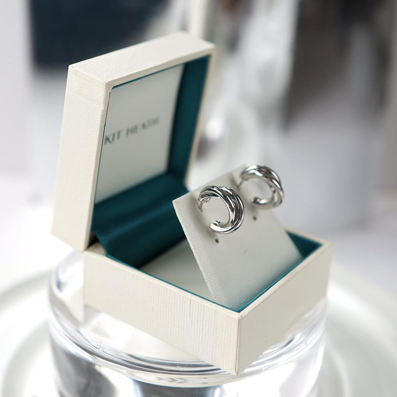 The Bevel Trilogy semi hoop earrings, a silver earrings from Kit Heath, available at OD’s Jewellers in St Helens