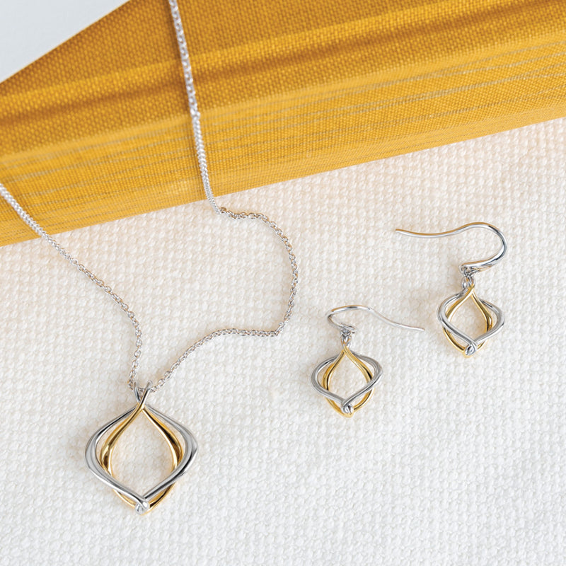 The Kit Heath Alicia Golden Petite Drop Earrings, a silver and gold plated earring from Kit Heath, available at OD’s Jewellers in St Helens