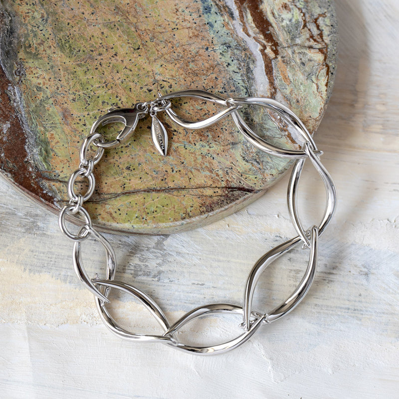 The Entwine Twine Twist Link Bracelet, a silver sterling bracelet from Kit Heath, available at OD’s Jewellers in St Helens