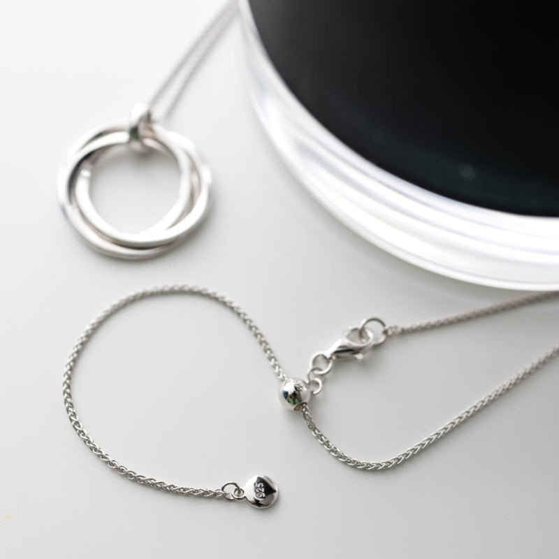 The Kit Heath Bevel Trilogy Grande adjustable slider necklace, a silver necklace from Kit Heath, available at OD’s Jewellers in St Helens