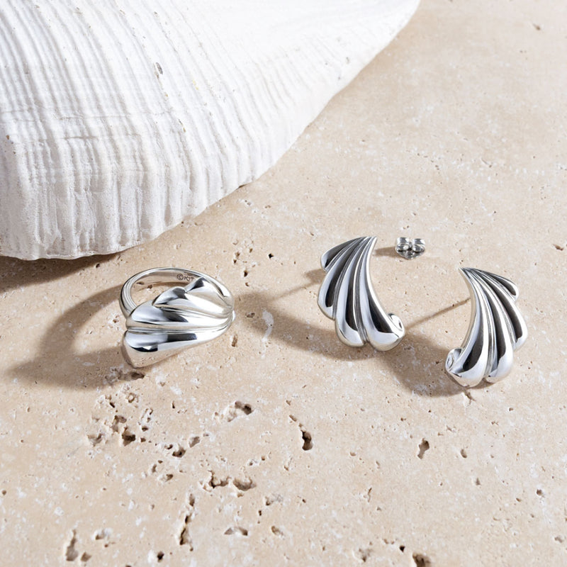 The Kit Heath Océane Shell Echo Grande Ring, a silver sterling ring from Kit Heath, available at OD’s Jewellers in St Helens