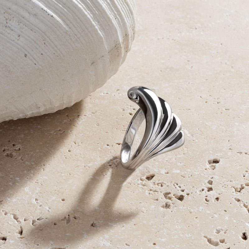 The Kit Heath Océane Shell Echo Grande Ring, a silver sterling ring from Kit Heath, available at OD’s Jewellers in St Helens