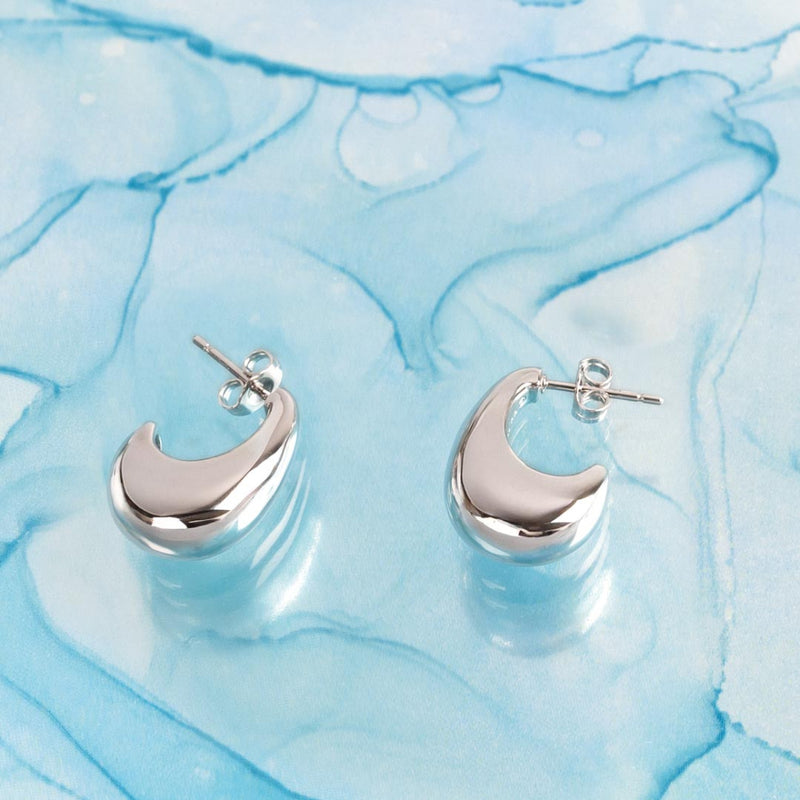 The Kit Heath Coast Pebble Smooth Grande Semi Hoop Stud Earrings, a silver hoop earrings from Kit Heath, available at OD’s Jewellers in St Helens