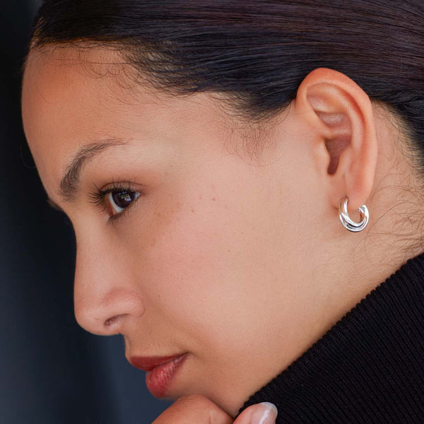 The Kit Heath Bevel Trilogy Semi Hoop Stud Earrings, a sterling silver earrings from Kit Heath, available at OD’s Jewellers in St Helens