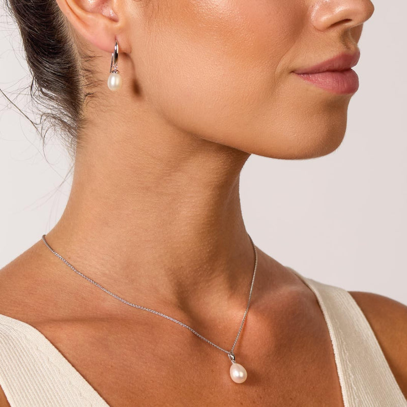 The Kit Heath Revival Classic Pearl Drop Earring, a white silver earring from Kit Heath, available at OD’s Jewellers in St Helens