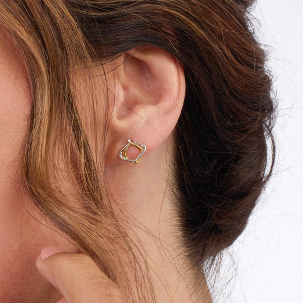 The Kit Heath Alicia Golden Petite Stud Earrings, a two-tone gold and silver stud from Kit Heath, available at OD’s Jewellers in St Helens