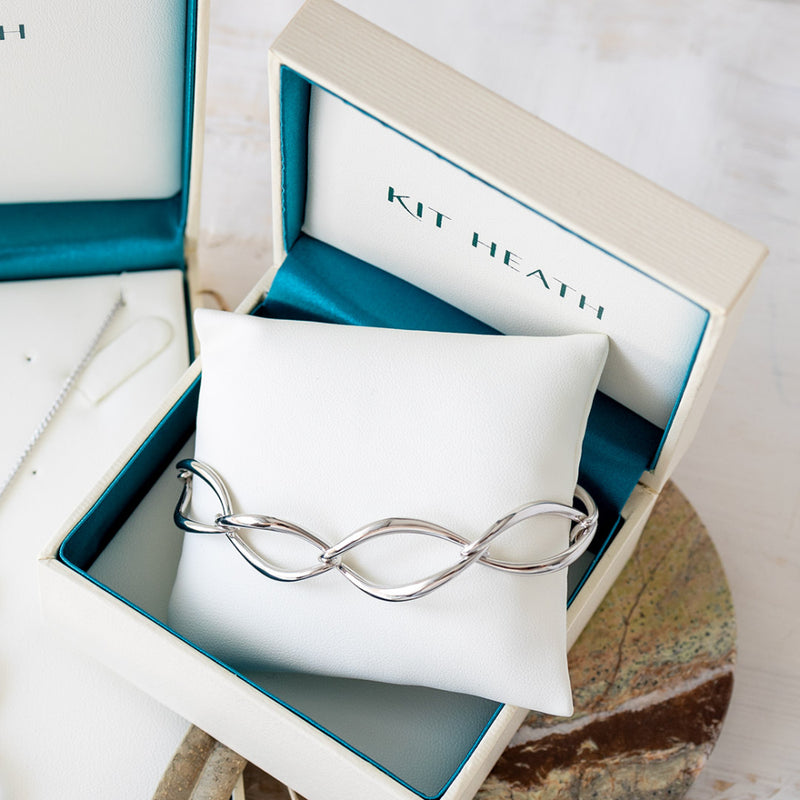 The Kit Heath Entwine Twine Twist Link Bracelet, a silver bracelet from Kit Heath, available at OD’s Jewellers in St Helens