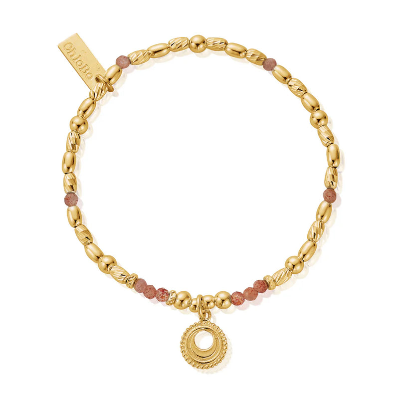 The ChloBo Peach Moonstone-Sacral Chakra bracelet, a peach moonstone and gold plated sterling silver bracelet from ChloBo, available at OD’s Jewellers in St Helens