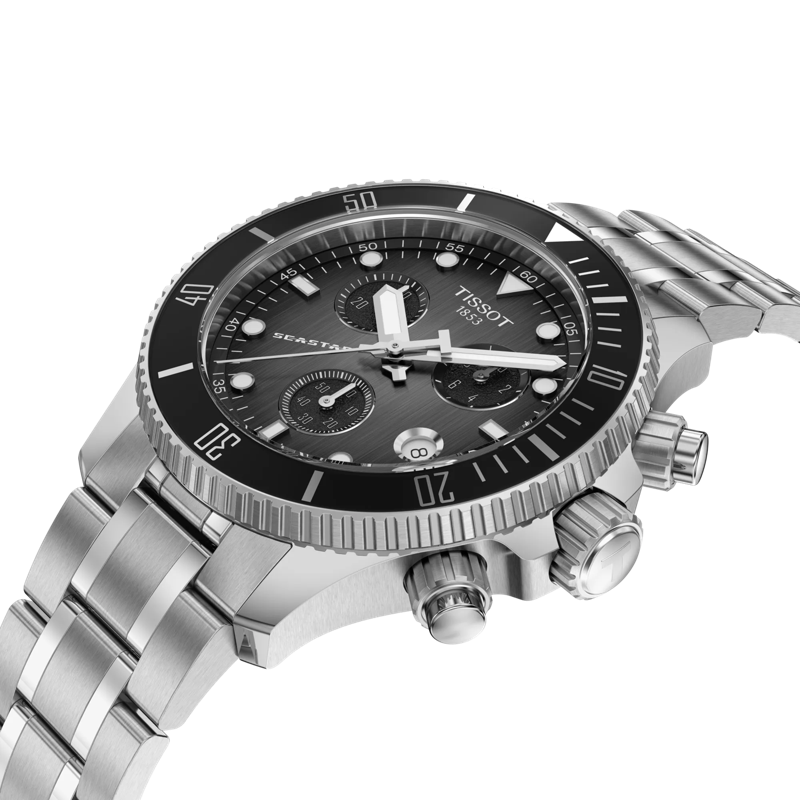 Close-up of the Tissot Seastar 1000 watch highlighting its grey dial, black bezel, stainless steel bracelet, and chronograph