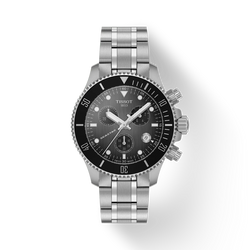 Tissot Seastar 1000 watch displaying intricate dial details, including sub-dials and date window. Focus on high-quality